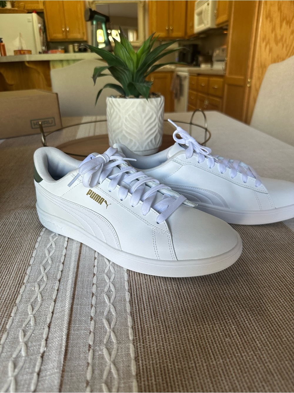 Puma Men's White Low-Top Sneakers with Gold Logo Accent